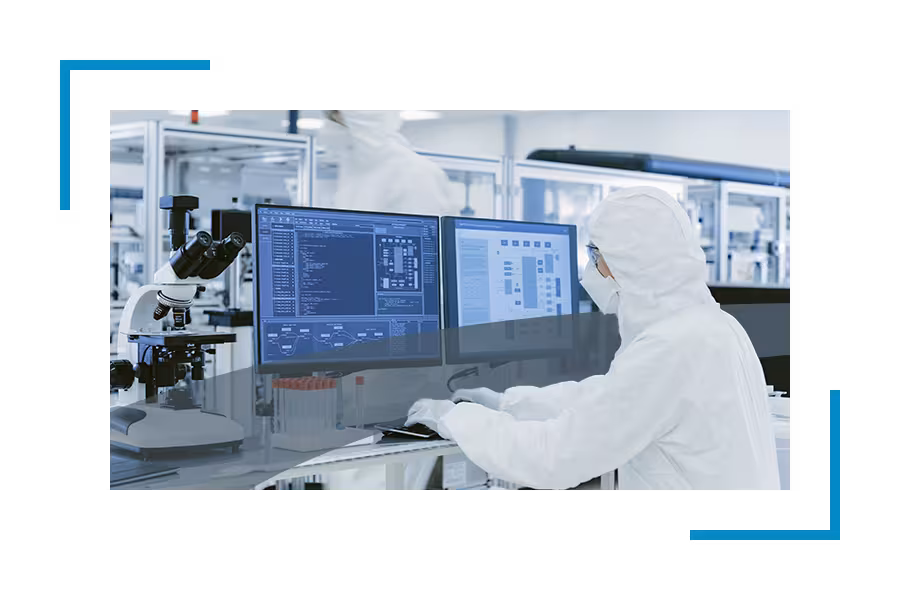 biotechnology security services: someone in hazmat suit working at computer