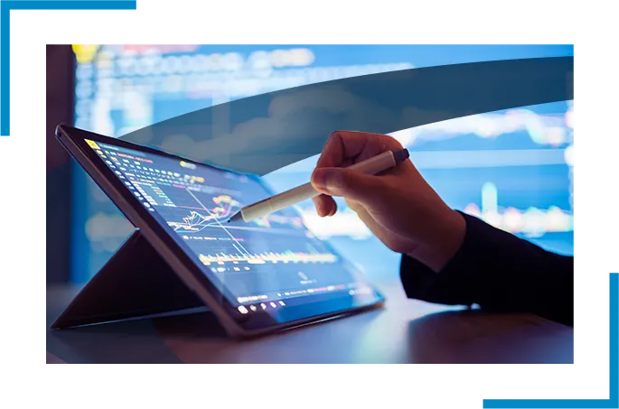 A business professional looking at a tablet